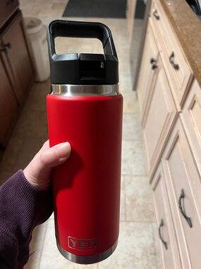 YETI Red Rambler Bottle with Black Lid and Stainless Accents